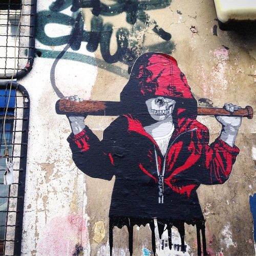 Skeleton character street art mural with red and black hoodie holding club, Berlin